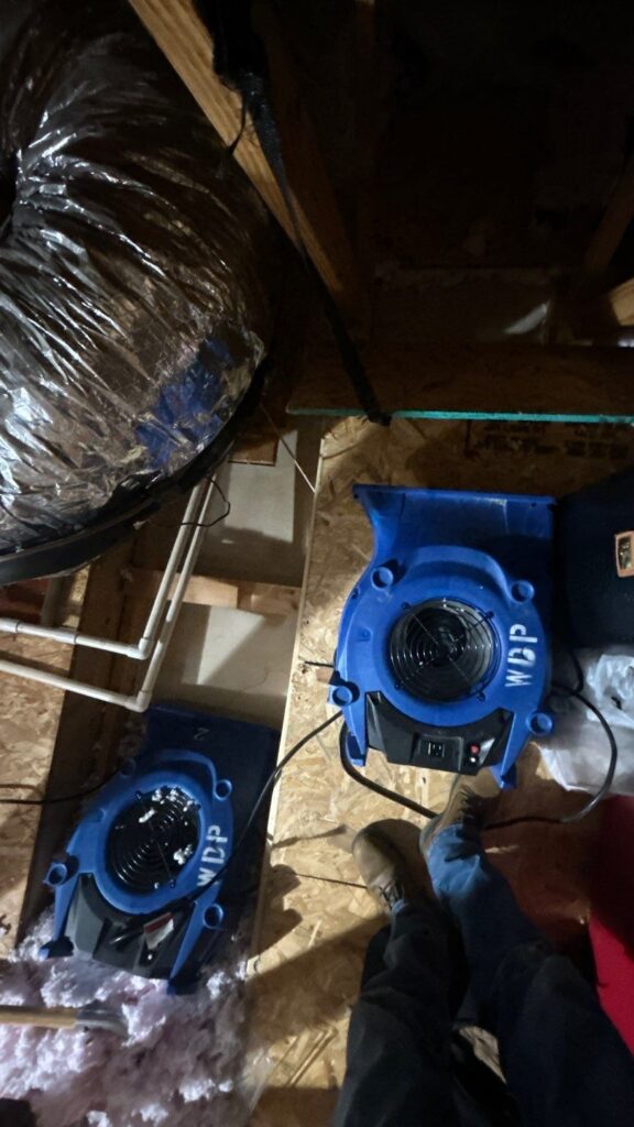 Drying equipment used near wet insulation after water damage in Nashville home